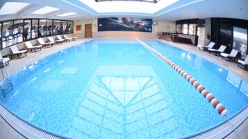 Indoor pool, outdoor pool, open 7:00 AM to 10:00 PM, sun loungers