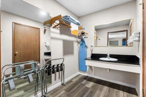 Desk, laptop workspace, blackout curtains, iron/ironing board