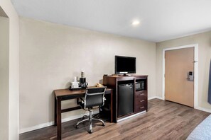 Room, 1 King Bed, Non Smoking | Desk, laptop workspace, blackout drapes, iron/ironing board