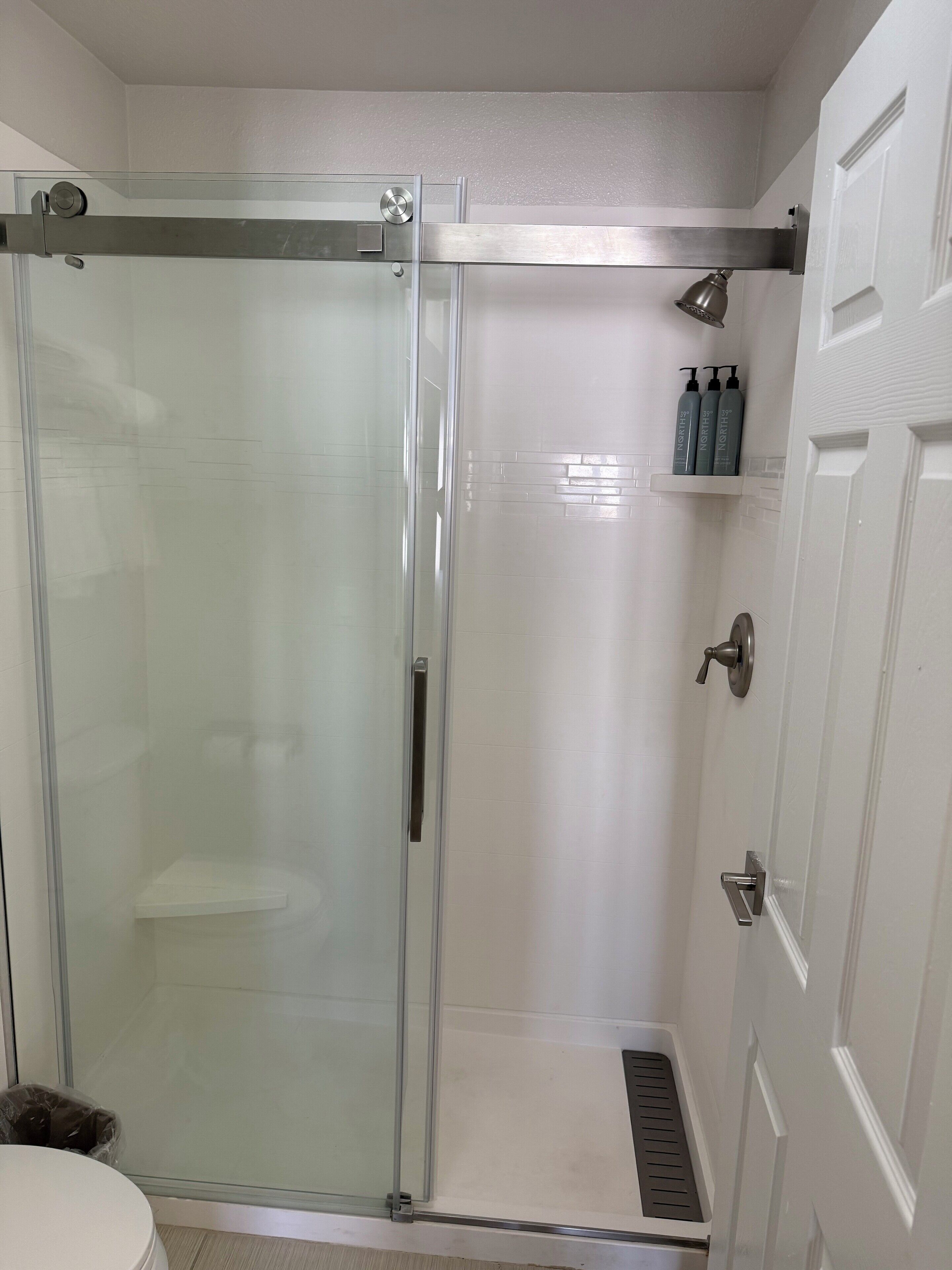 combined shower/bathtub, free toiletries, hair dryer, towels