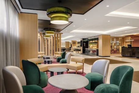 Sala de estar en el lobby. Danubius Hotel Arena