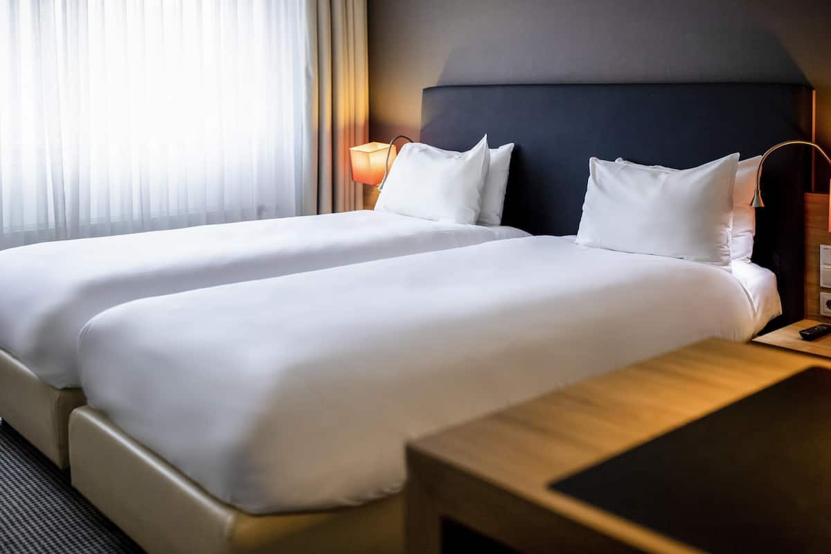 Klassieke Twin kamer | 1 slaapkamer, een kluis op de kamer, een bureau, een laptopwerkplek