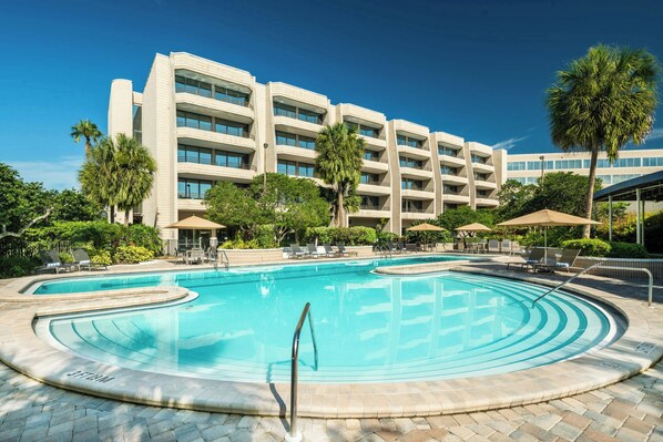 Outdoor pool, open 9:00 AM to 6:00 PM, pool umbrellas