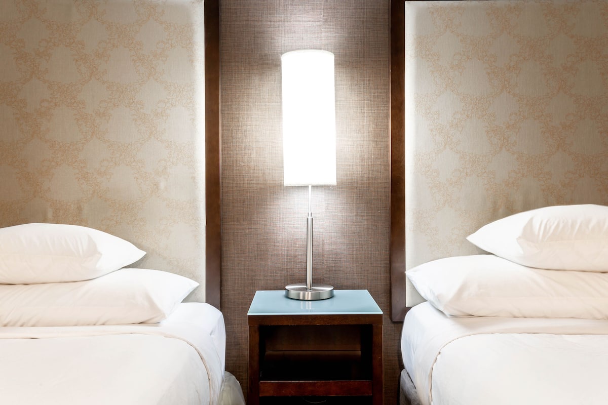 Premium bedding, in-room safe, individually furnished, blackout curtains