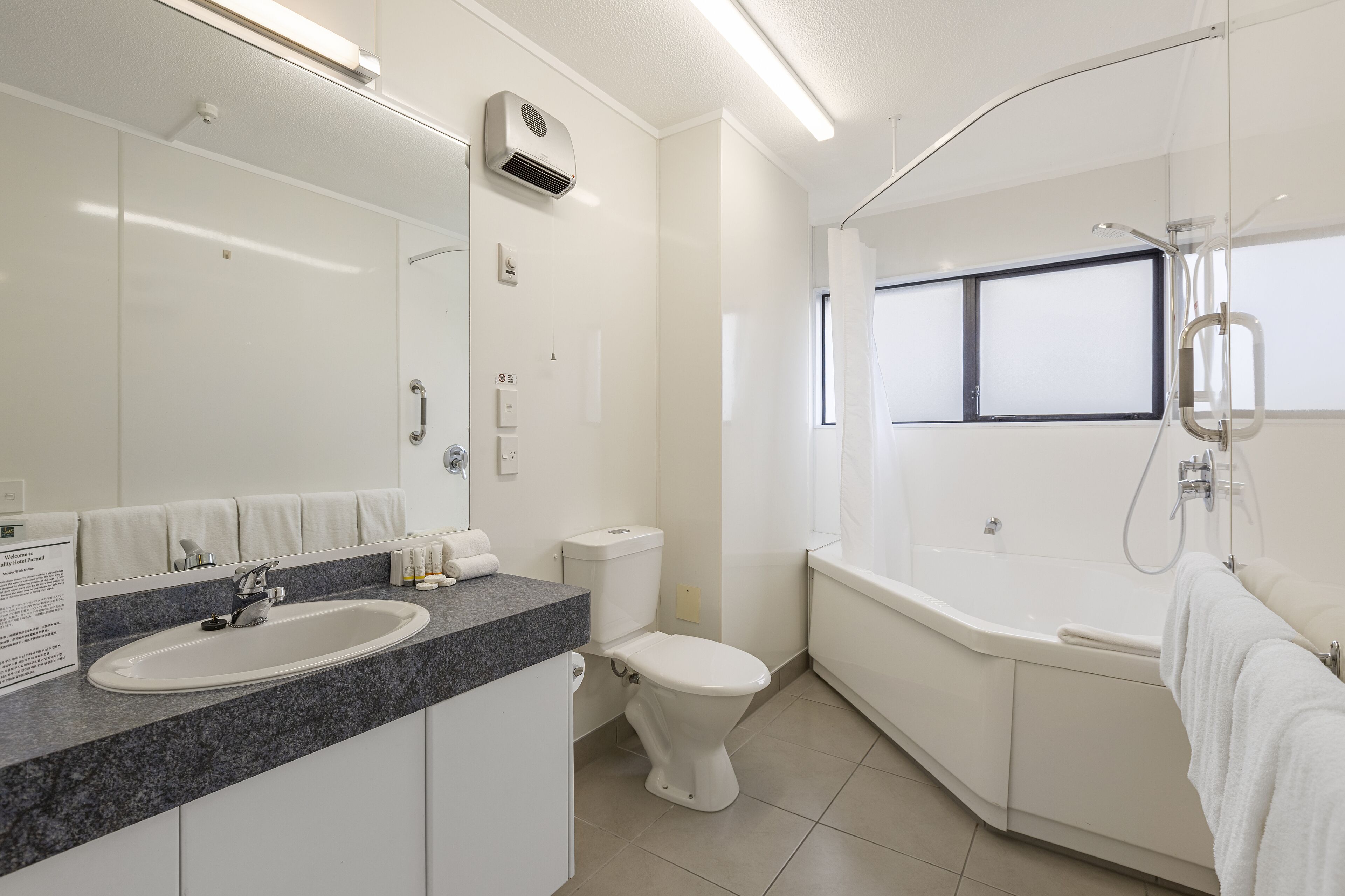 eco-friendly toiletries, hair dryer, towels