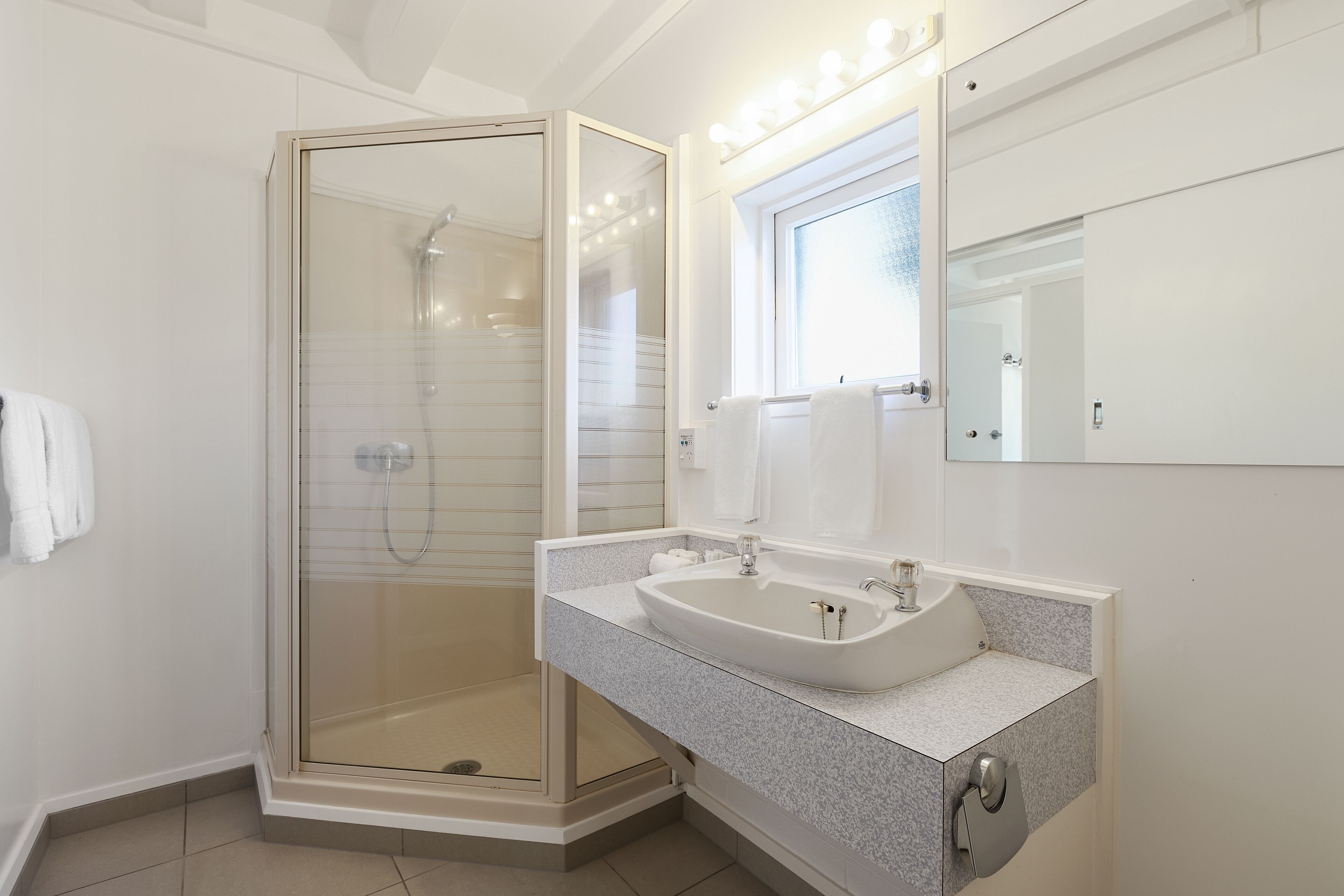 standard two bedroom apartment | bathroom | eco-friendly toiletries, hair dryer, towels