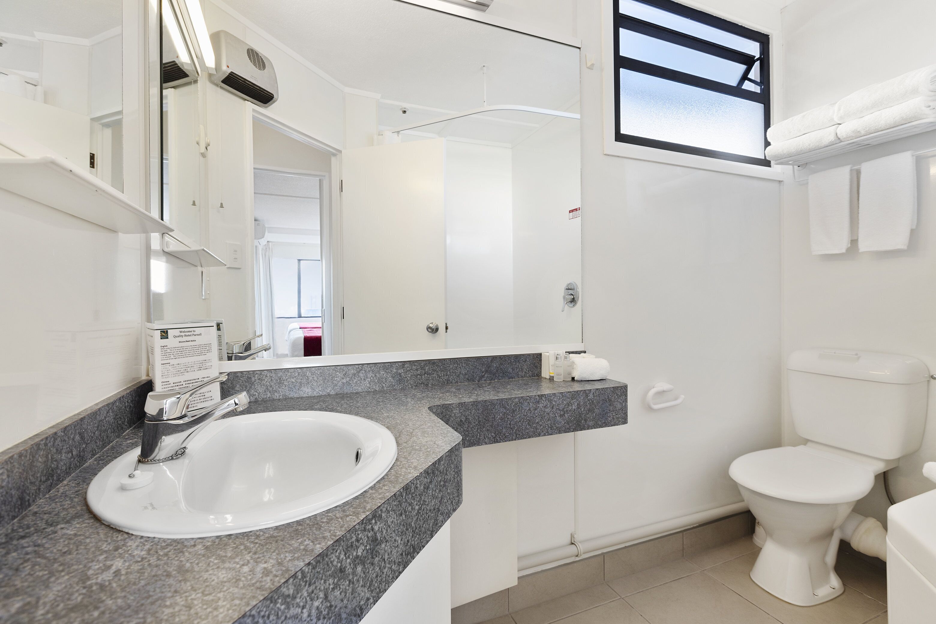 one bedroom suite with balcony | bathroom | eco-friendly toiletries, hair dryer, towels