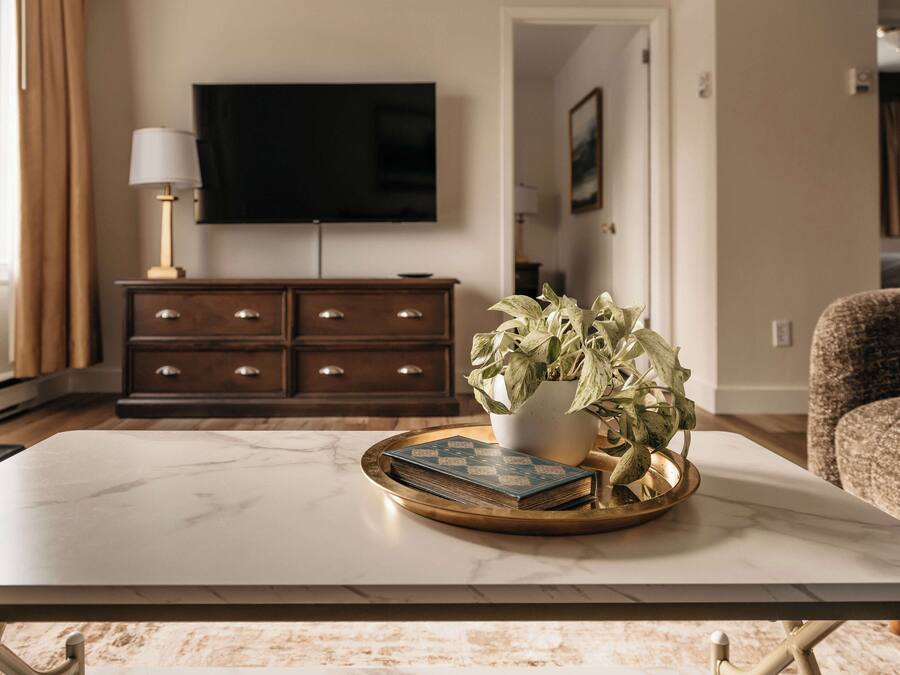 Superior Suite, 2 Queen Beds | Living area | 32-inch flat-screen TV with cable channels, TV