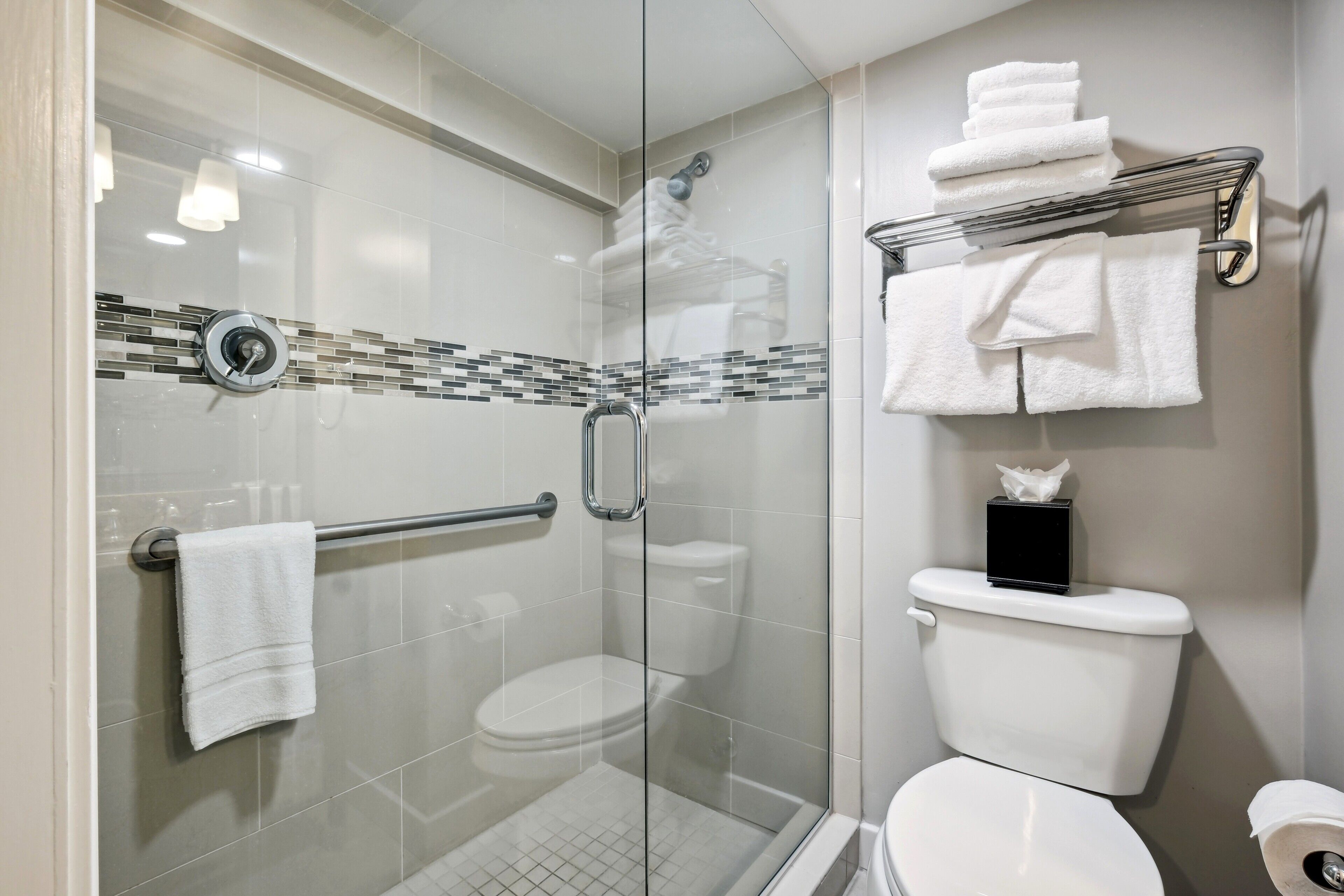 shower, eco-friendly toiletries, hair dryer, towels