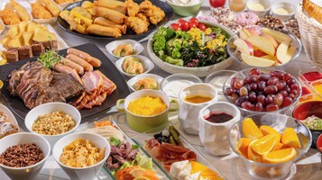 A variety of food items including meats, fruits, and vegetables.
