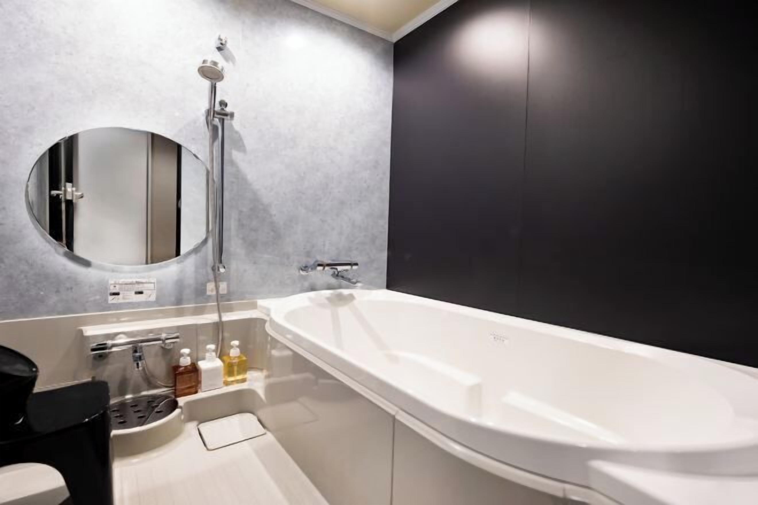 Separate bathtub and shower, eco-friendly toiletries, hair dryer