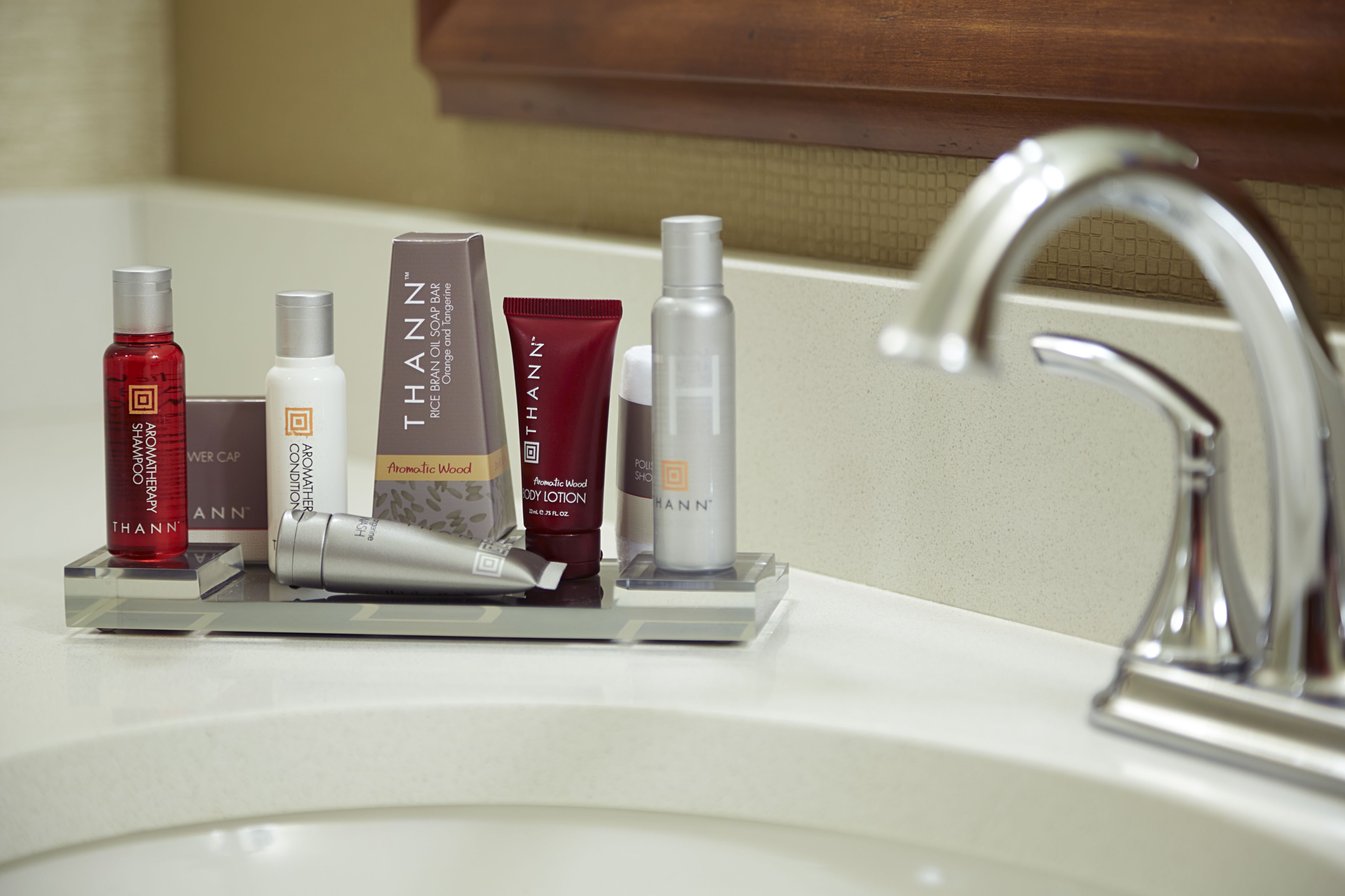 combined shower/bathtub, designer toiletries, hair dryer, towels