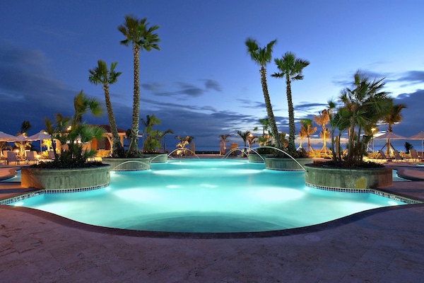 2 outdoor pools, open 7:00 AM to 10:00 PM, pool umbrellas, sun loungers