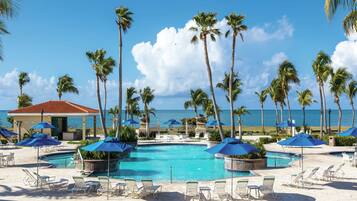2 outdoor pools, open 7:00 AM to 10:00 PM, pool umbrellas, sun loungers