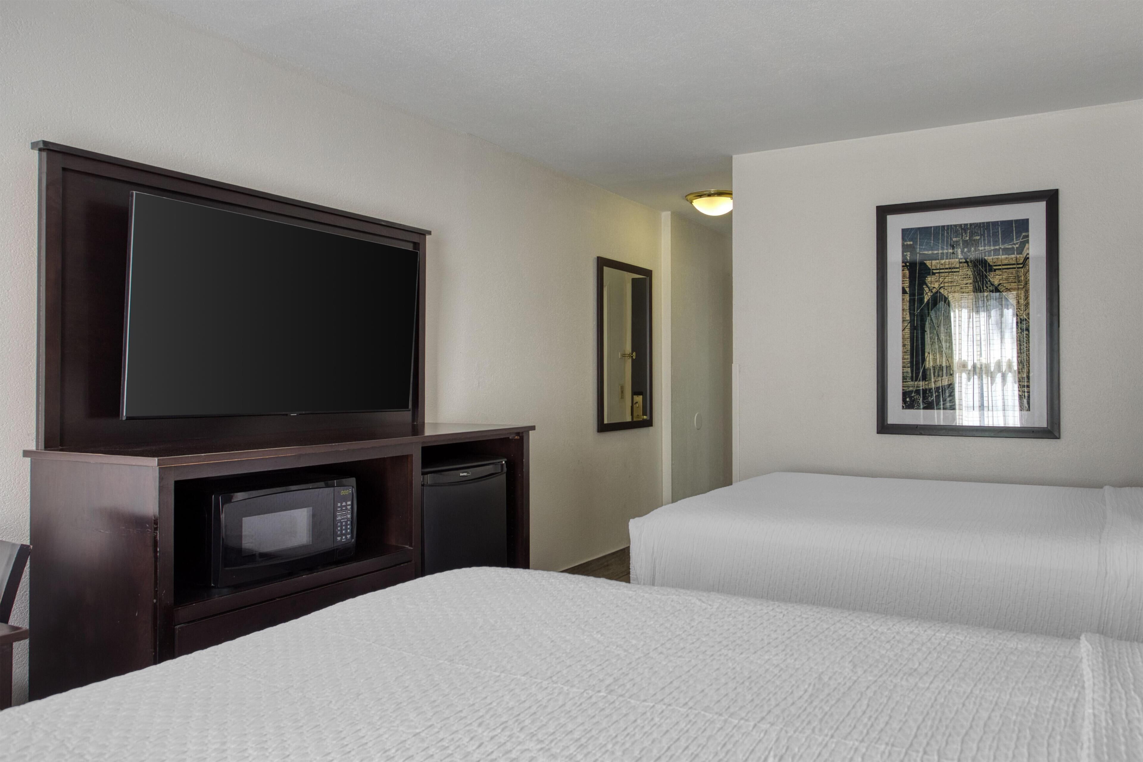 Standard Room, 2 Double Beds, Refrigerator & Microwave | Laptop workspace, blackout drapes, iron/ironing board