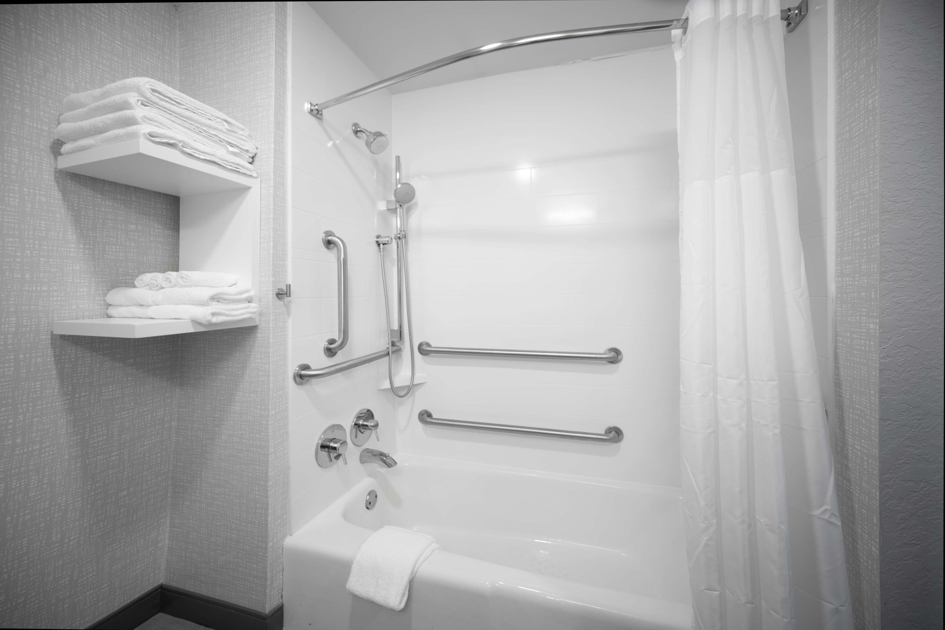 room, 1 king bed, accessible, non smoking (mobility & hearing, roll-in shower) | bathroom | free toiletries, hair dryer, towels