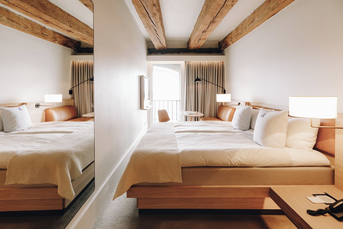 Ropa de cama de alta calidad, colchones con pillow-top y minibar 