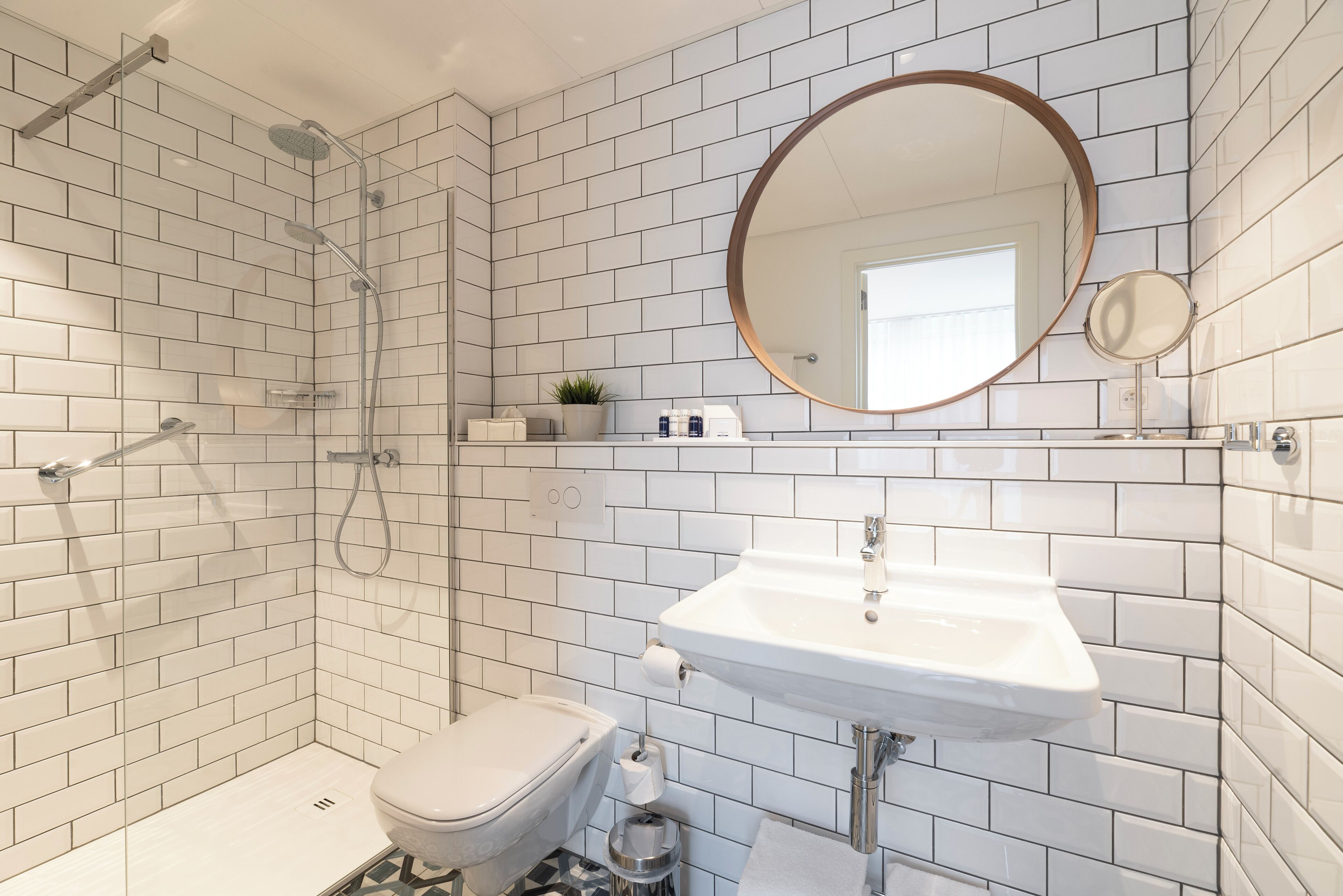 eco-friendly toiletries, hair dryer, towels, soap