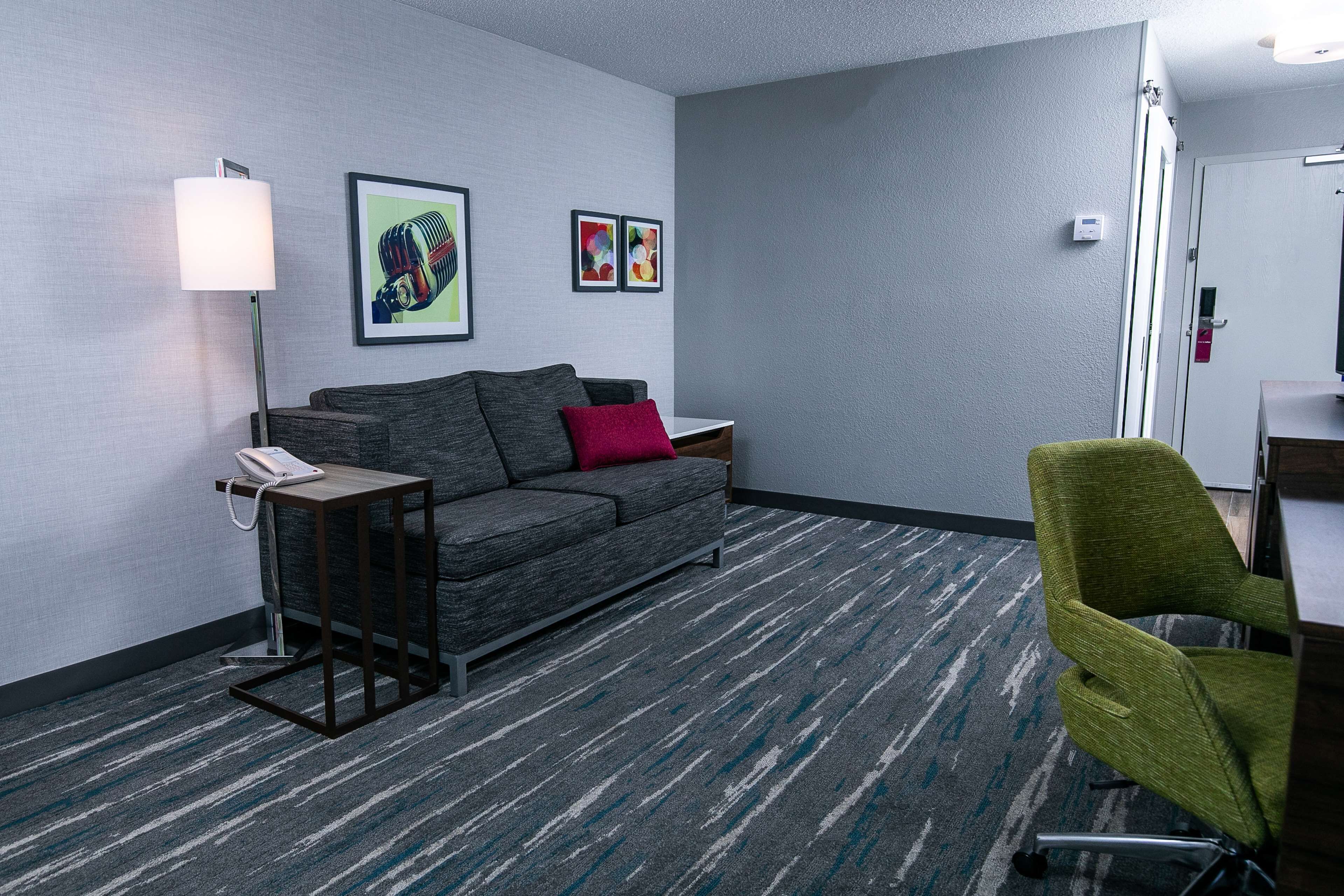 suite, 1 king bed, non smoking | living area | 50-inch tv with satellite channels