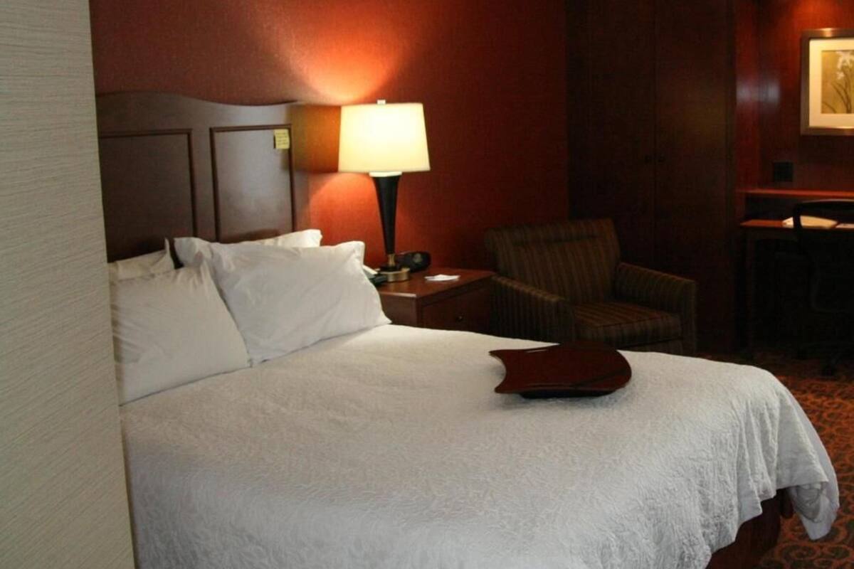 Desk, laptop workspace, iron/ironing board, free cribs/infant beds