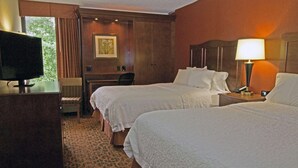 A hotel room with two beds, a desk, a television, and a lamp. - Hampton Inn Norfolk/Chesapeake (Greenbrier Area) (Chesapeake)