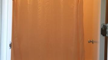 Combined shower/tub, eco-friendly toiletries