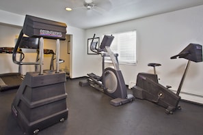 A fitness room with treadmills, an elliptical, and a stationary bike. - Holiday Inn Express Mackinaw City by IHG (Mackinaw City)