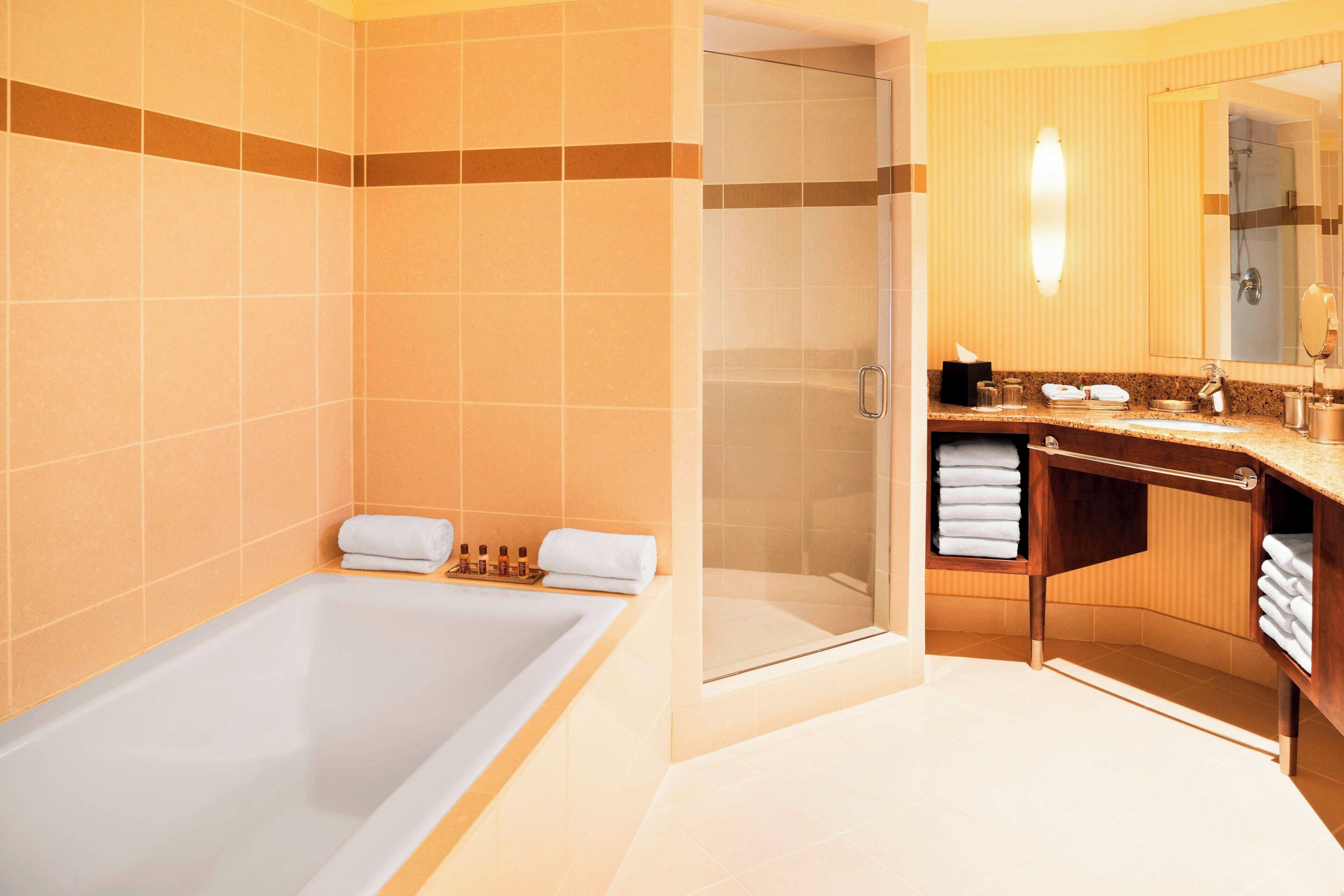 club suite, 1 king bed with sofa bed, non smoking | bathroom | free toiletries, hair dryer, towels, soap