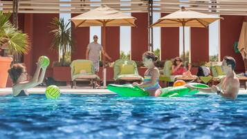 Indoor pool, outdoor pool, pool umbrellas, sun loungers