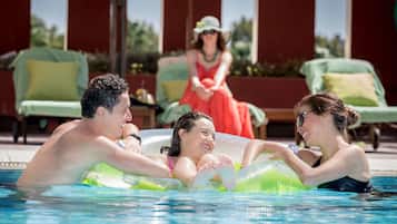 Indoor pool, outdoor pool, pool umbrellas, sun loungers