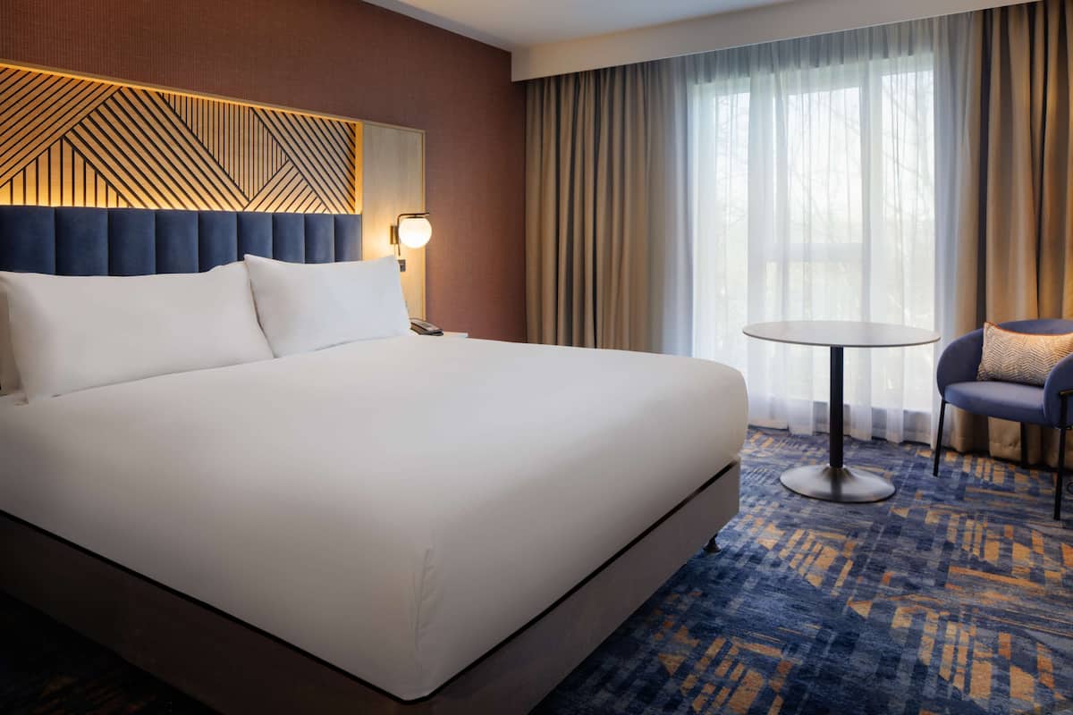 in-room safe, desk, blackout curtains, iron/ironing board