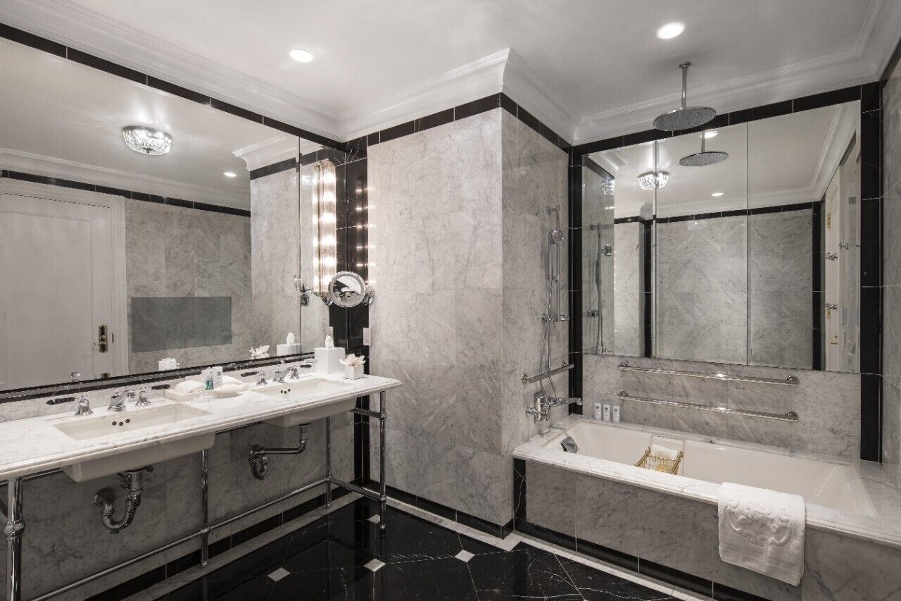 Combined shower/tub, designer toiletries, hair dryer, bathrobes