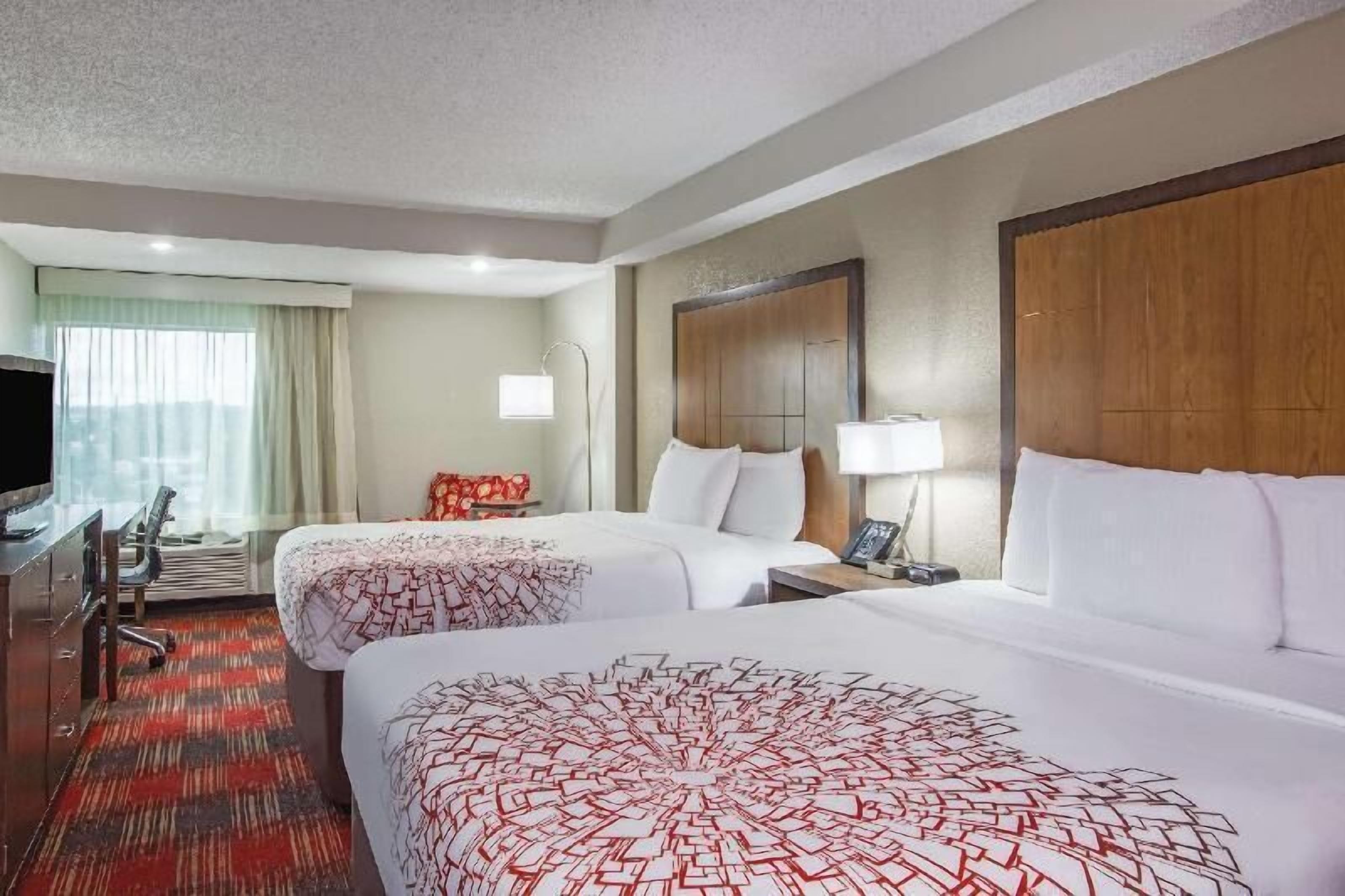 Premium bedding, desk, blackout drapes, iron/ironing board