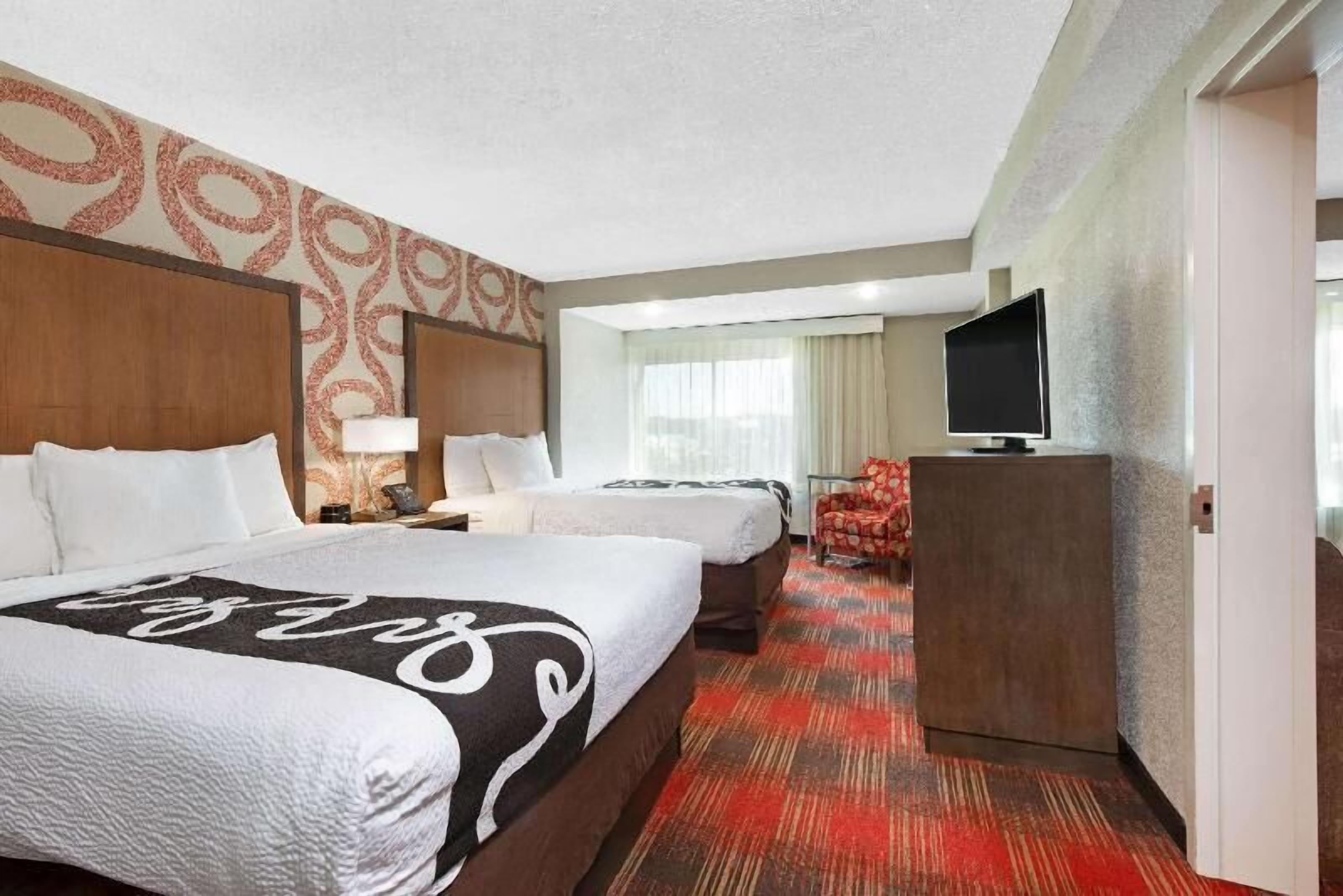 Premium bedding, desk, blackout drapes, iron/ironing board