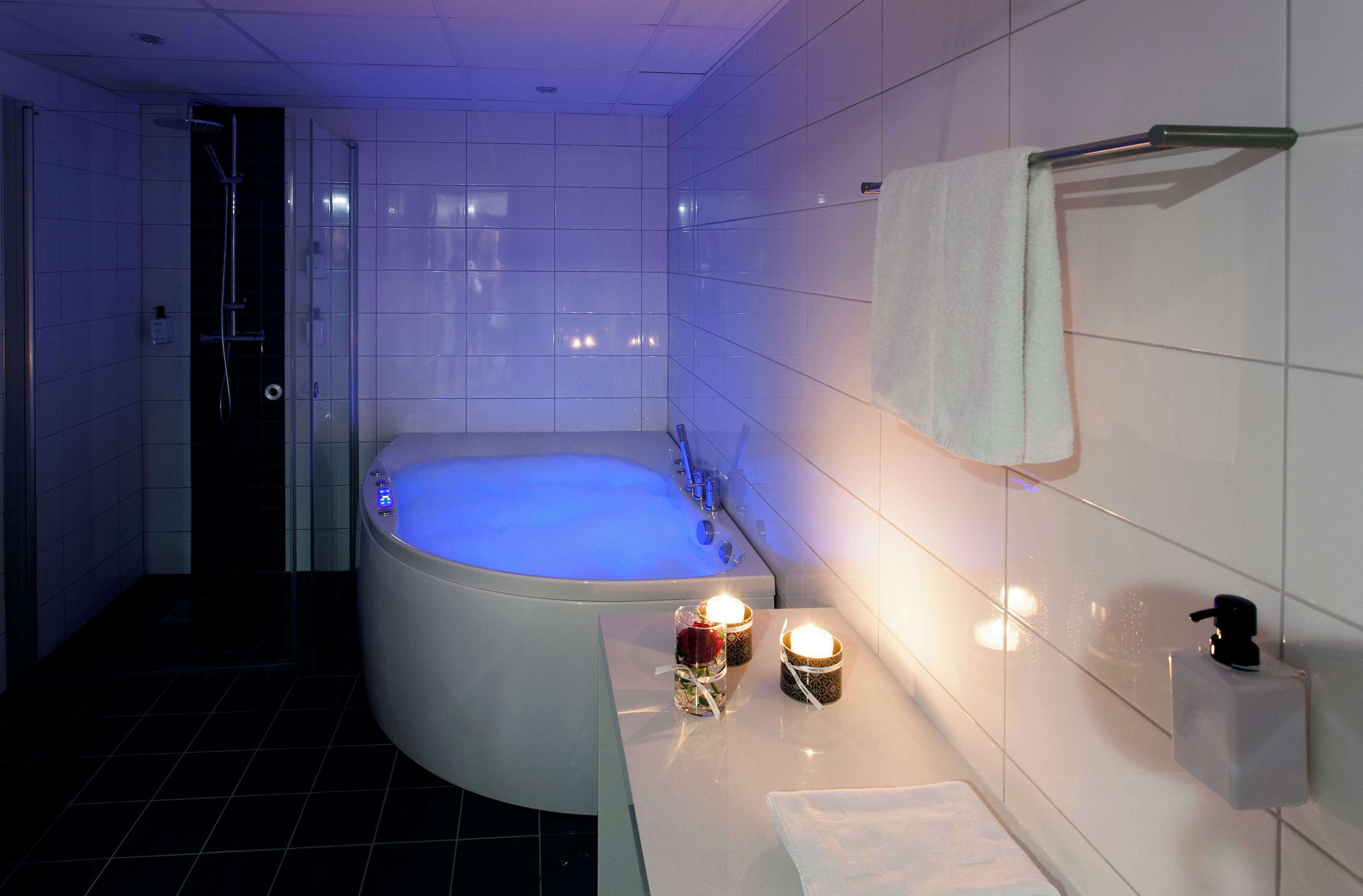 eco-friendly toiletries, hair dryer, towels