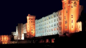 A large, multi-story building with a castle-like tower and a sign reading "Norris Castle Hotel". - Norbreck Castle Hotel Blackpool (Blackpool)