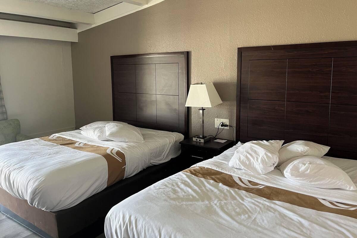 Deluxe Room, 2 Queen Beds, Non Smoking | Down comforters, desk, blackout drapes, iron/ironing board