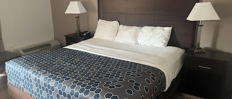 Deluxe Room, 1 King Bed, Non Smoking | In-room safe, desk, blackout curtains, iron/ironing board