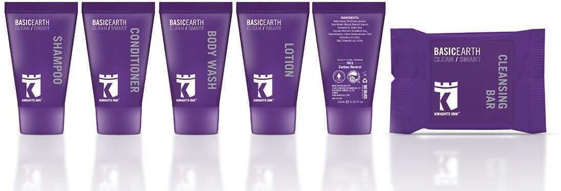A row of five purple tubes labeled with different skincare products from the brand 'BASICEARTH'.