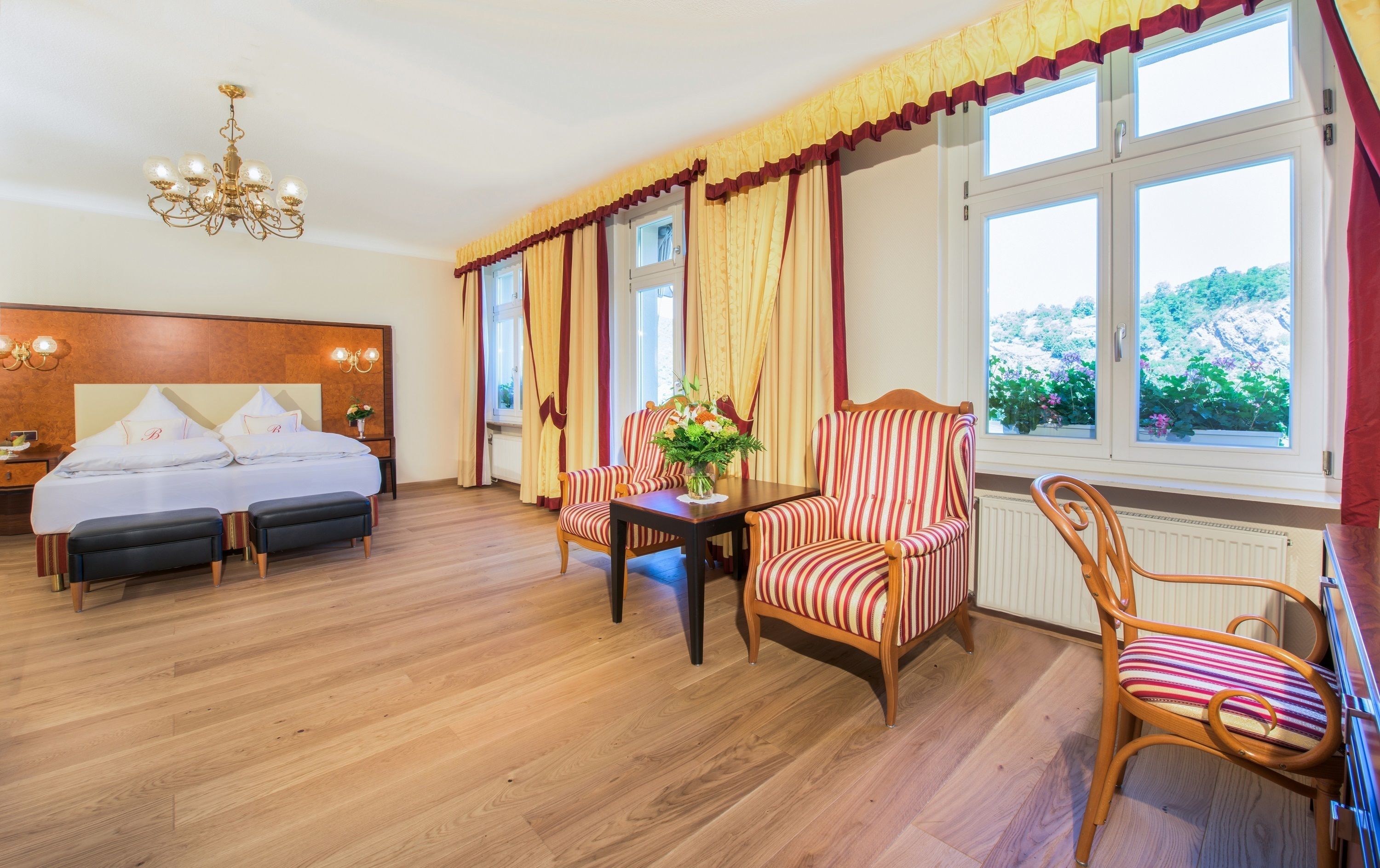 deluxe double room | minibar, in-room safe, desk, laptop workspace