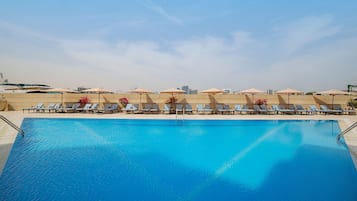 2 outdoor pools, open 8:00 AM to 8:00 PM, pool umbrellas, sun loungers