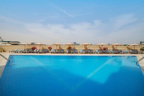 2 outdoor pools, open 8:00 AM to 8:00 PM, pool umbrellas, sun loungers