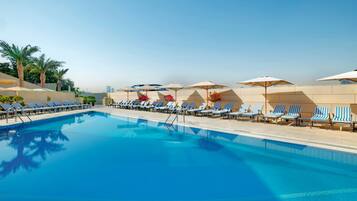 2 outdoor pools, open 8:00 AM to 8:00 PM, pool umbrellas, pool loungers