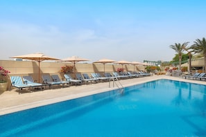 2 outdoor pools, open 8:00 AM to 8:00 PM, pool umbrellas, pool loungers