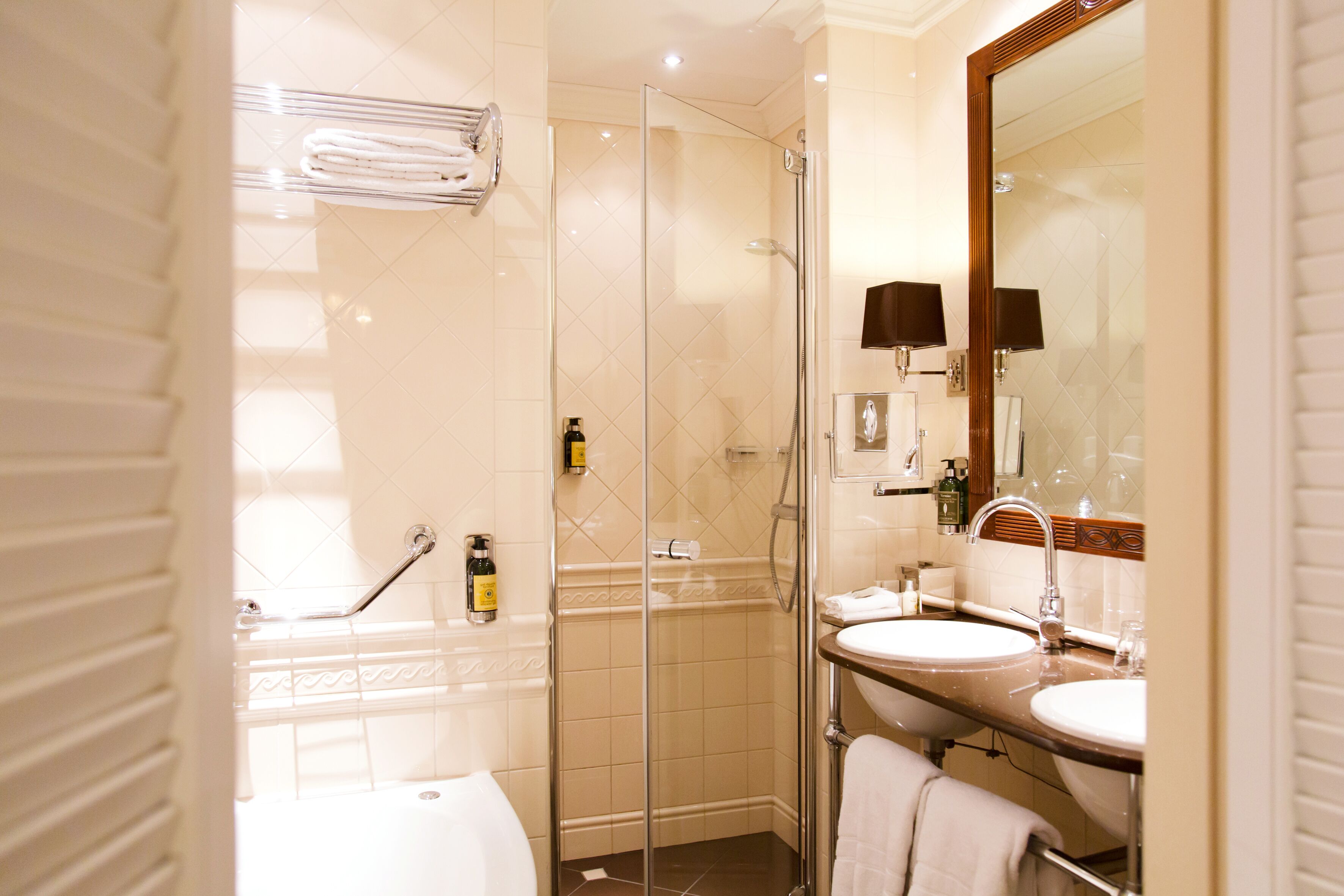deluxe double or twin room | bathroom | eco-friendly toiletries, hair dryer, bathrobes, slippers