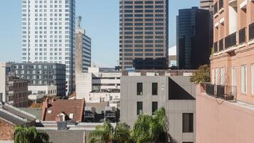 A cityscape with high-rise buildings, including a prominent 'Entergy' sign.