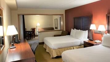 Desk, laptop workspace, blackout drapes, iron/ironing board