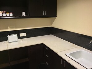 Executive Suite | Private kitchenette | Coffee/tea maker