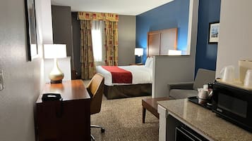 Premium bedding, desk, laptop workspace, iron/ironing board