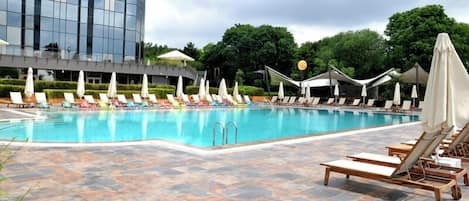 Indoor pool, seasonal outdoor pool, pool umbrellas